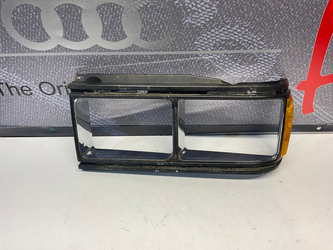 Driver Headlight Bezel 813941625C B2 URQ 4000 Black